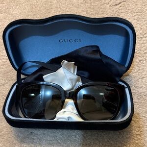 Gucci Dark Sunglasses with Elegant Case